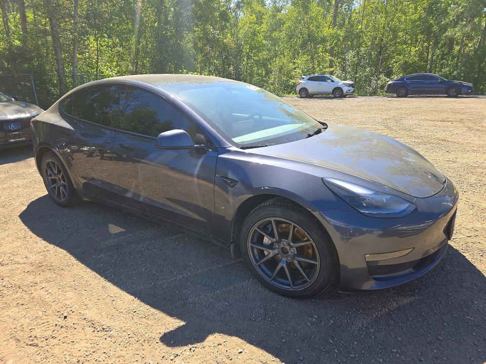 Photo 4 from auction – 2023 TESLA MODEL 3 with VIN 5YJ3E1EB9PF679826