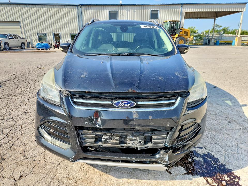 Photo 5 from auction – 2014 FORD ESCAPE with VIN 1FMCU9J98EUA70828