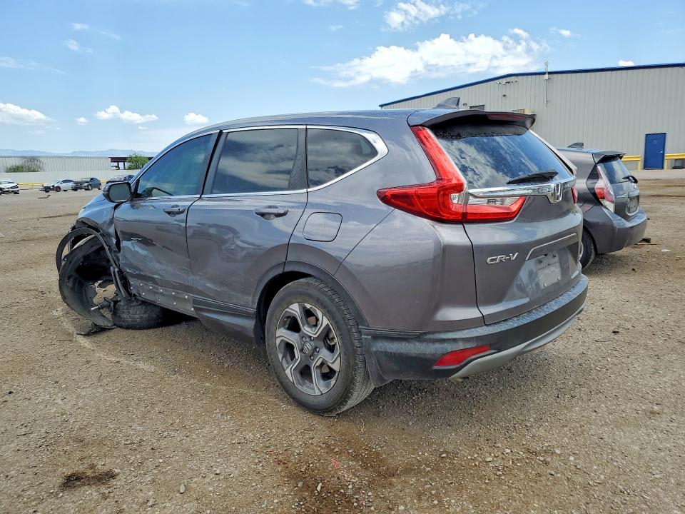 Photo 2 from auction – 2018 HONDA CR-V with VIN 7FARW1H8XJE028448