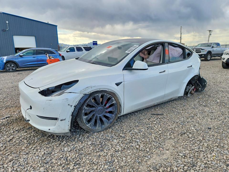 TESLA MODEL Y 2023 с VIN 7SAYGDEF1PF712860 - Снимка от търг