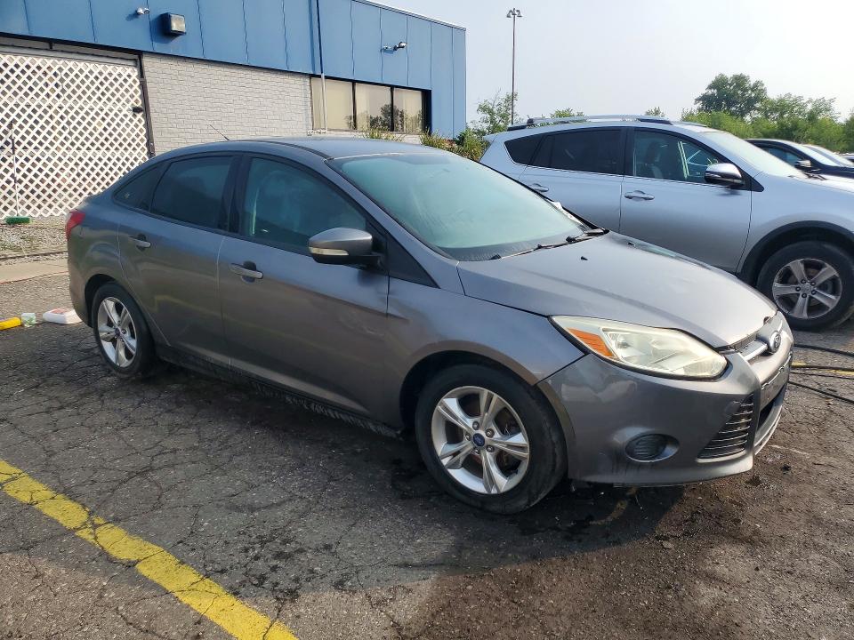 Photo 4 from auction – 2014 FORD FOCUS with VIN 1FADP3F20EL275791