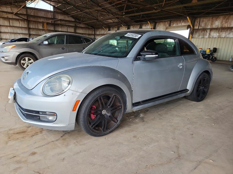 VOLKSWAGEN BEETLE 2012 with VIN 3VWVA7AT8CM614359 - Photo from auction