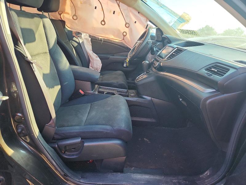 Photo 7 from auction – 2015 HONDA CR-V with VIN 2HKRM4H58FH625020
