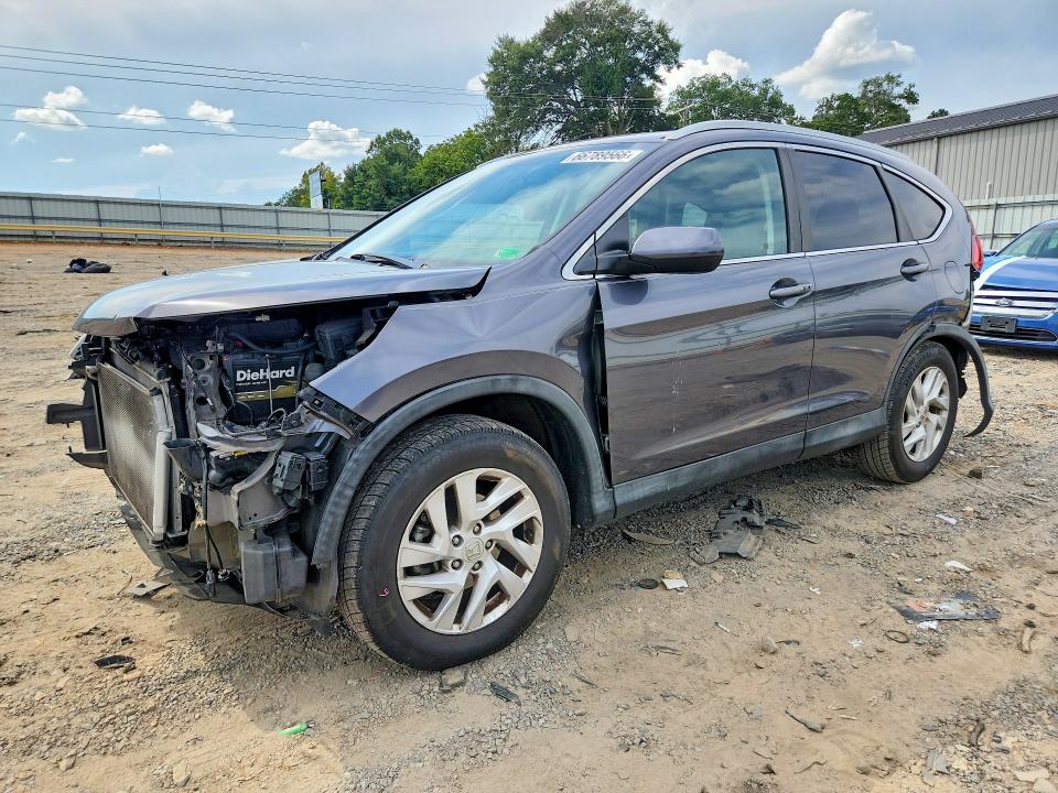 Photo 1 from auction – 2016 HONDA CR-V with VIN 2HKRM4H79GH697444