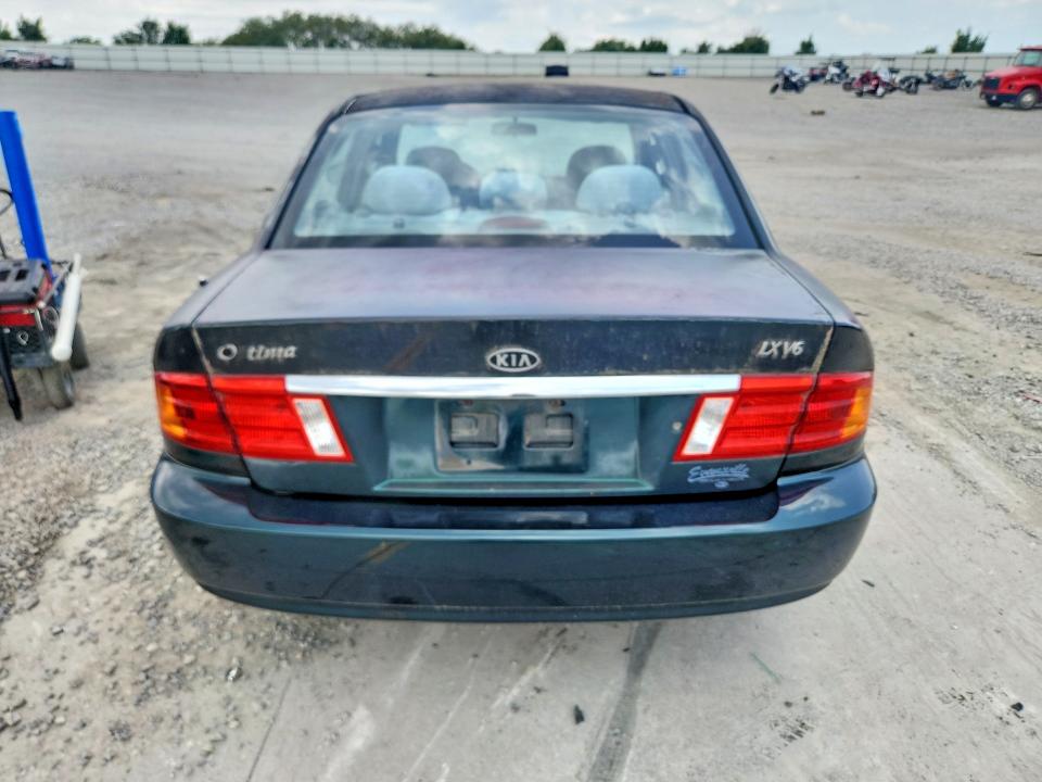 Photo 6 from auction – 2002 KIA OPTIMA with VIN KNAGD128125114426