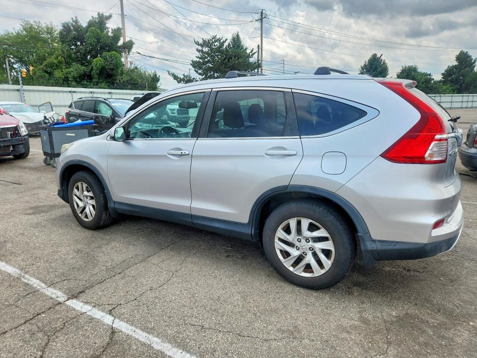 Photo 2 from auction – 2015 HONDA CR-V with VIN 2HKRM4H79FH617946