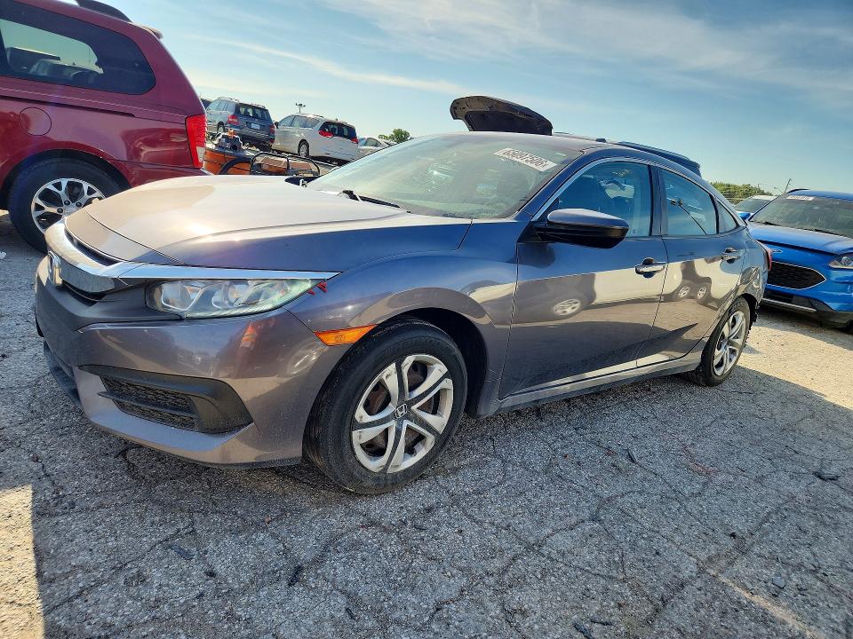HONDA CIVIC 2018 with VIN 19XFC2F52JE011624 - Photo from auction