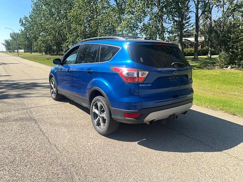 Photo 3 from auction – 2017 FORD ESCAPE with VIN 1FMCU9G95HUA55909