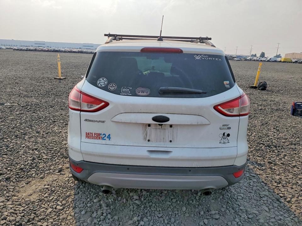 Photo 6 from auction – 2014 FORD ESCAPE with VIN 1FMCU9GX1EUE41592
