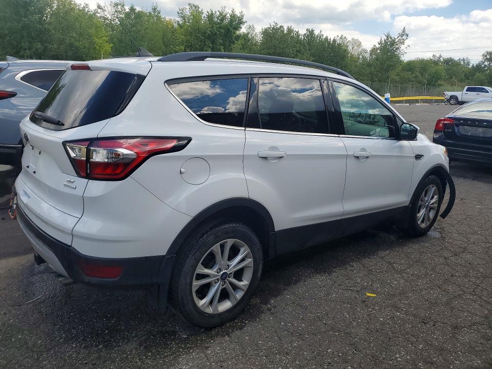 Photo 3 from auction – 2018 FORD ESCAPE with VIN 1FMCU0GD6JUD28085
