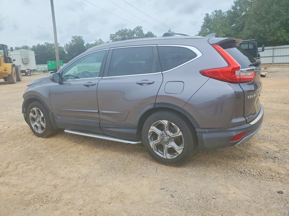Photo 2 from auction – 2017 HONDA CR-V with VIN 7FARW1H80HE005044
