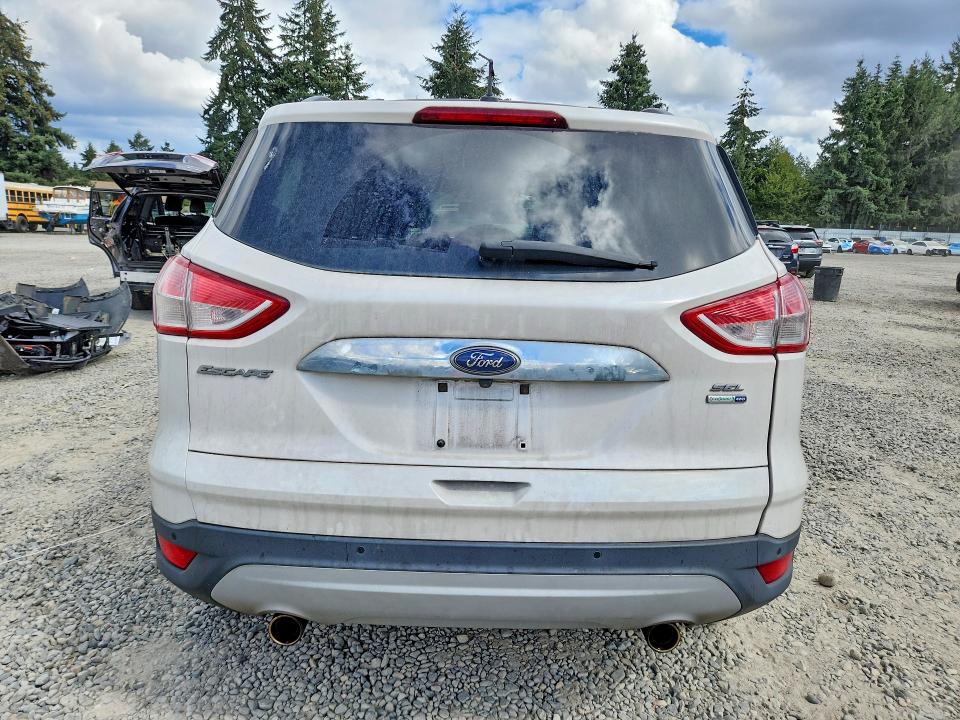 Photo 6 from auction – 2013 FORD ESCAPE with VIN 1FMCU9H94DUB56206