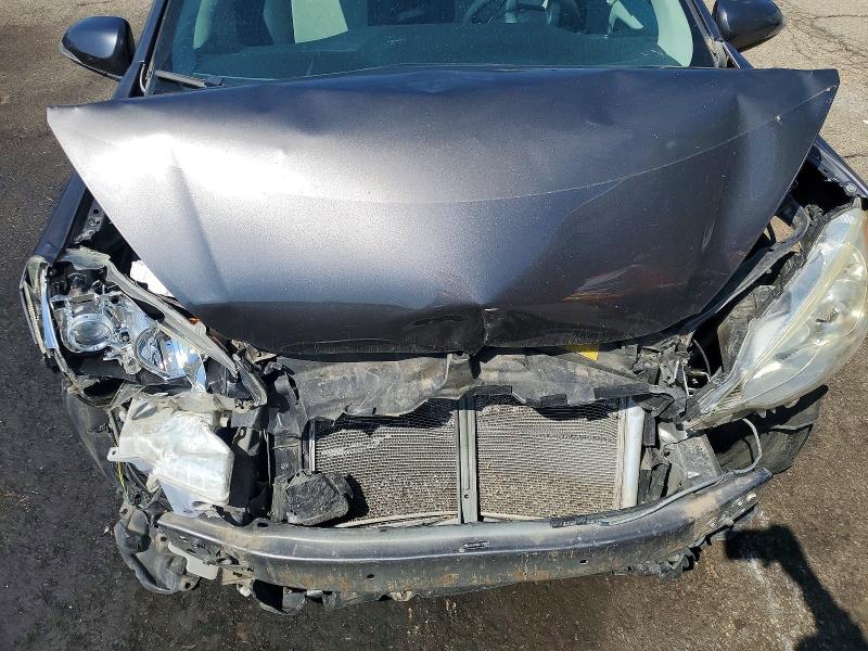 Photo 11 from auction – 2014 TOYOTA PRIUS C with VIN JTDKDTB36E1570849