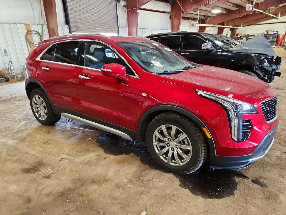 Photo 4 from auction – 2021 CADILLAC XT4 with VIN 1GYFZDR42MF035858