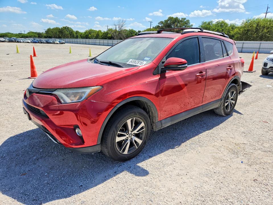 TOYOTA RAV4 2016 with VIN 2T3WFREV5GW264998 - Photo from auction