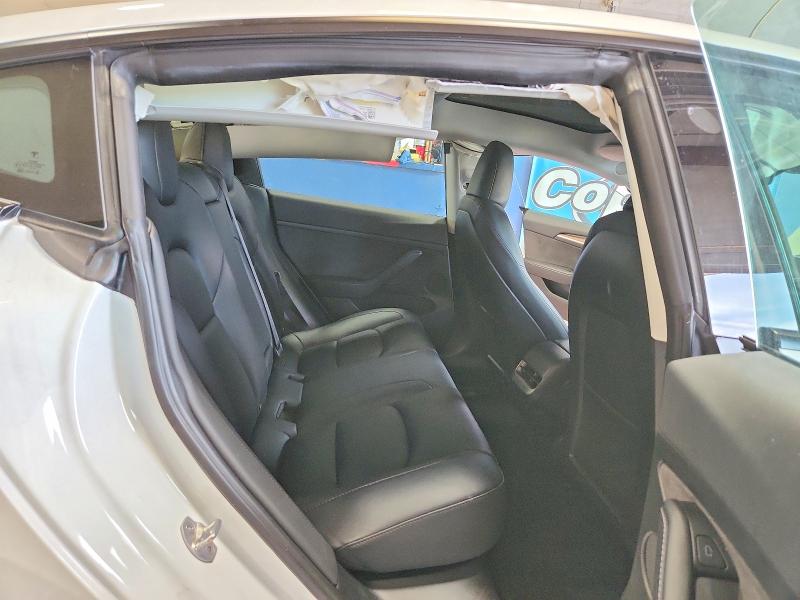 Снимка 10 от търг – 2023 TESLA MODEL 3 с VIN 5YJ3E1EA9PF498698