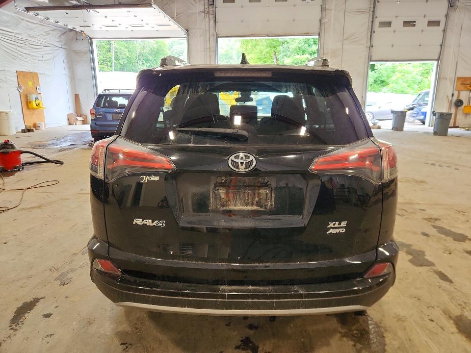 Photo 6 from auction – 2018 TOYOTA RAV4 with VIN 2T3RFREV4JW844442