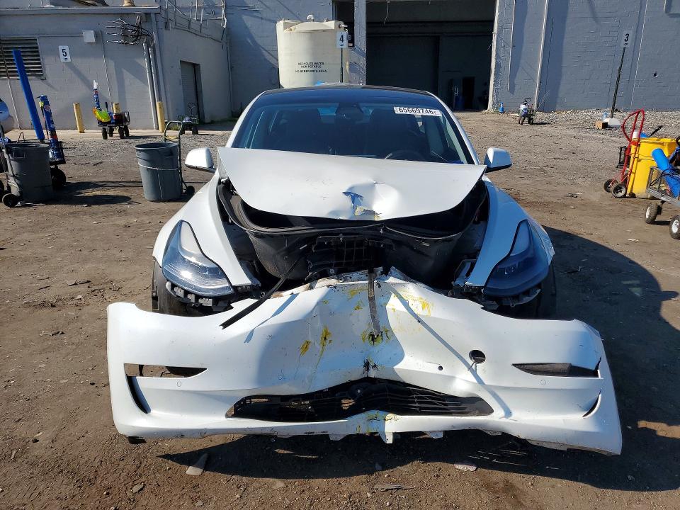 Photo 5 from auction – 2021 TESLA MODEL 3 with VIN 5YJ3E1EA3MF045401