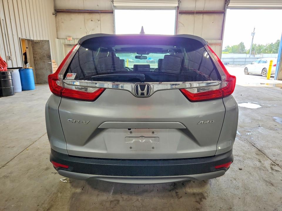 Photo 6 from auction – 2018 HONDA CR-V with VIN 7FARW2H86JE067544