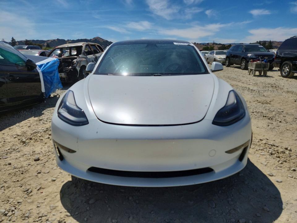 Photo 5 from auction – 2021 TESLA MODEL 3 with VIN 5YJ3E1EC9MF074001