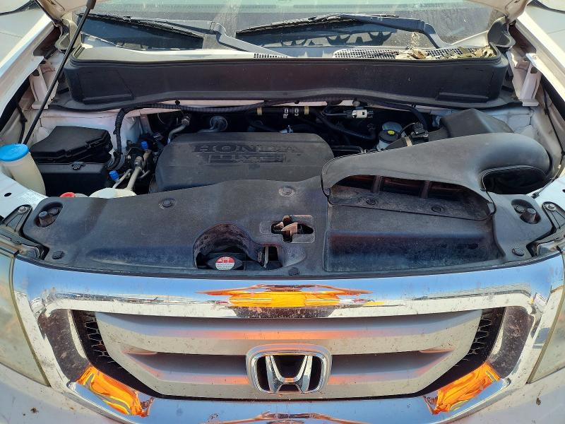 Photo 11 from auction – 2011 HONDA PILOT with VIN 5FNYF3H7XBB040420