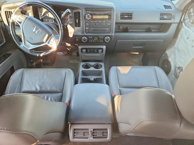 Photo 8 from auction – 2011 HONDA RIDGELINE with VIN 5FPYK1F53BB009390