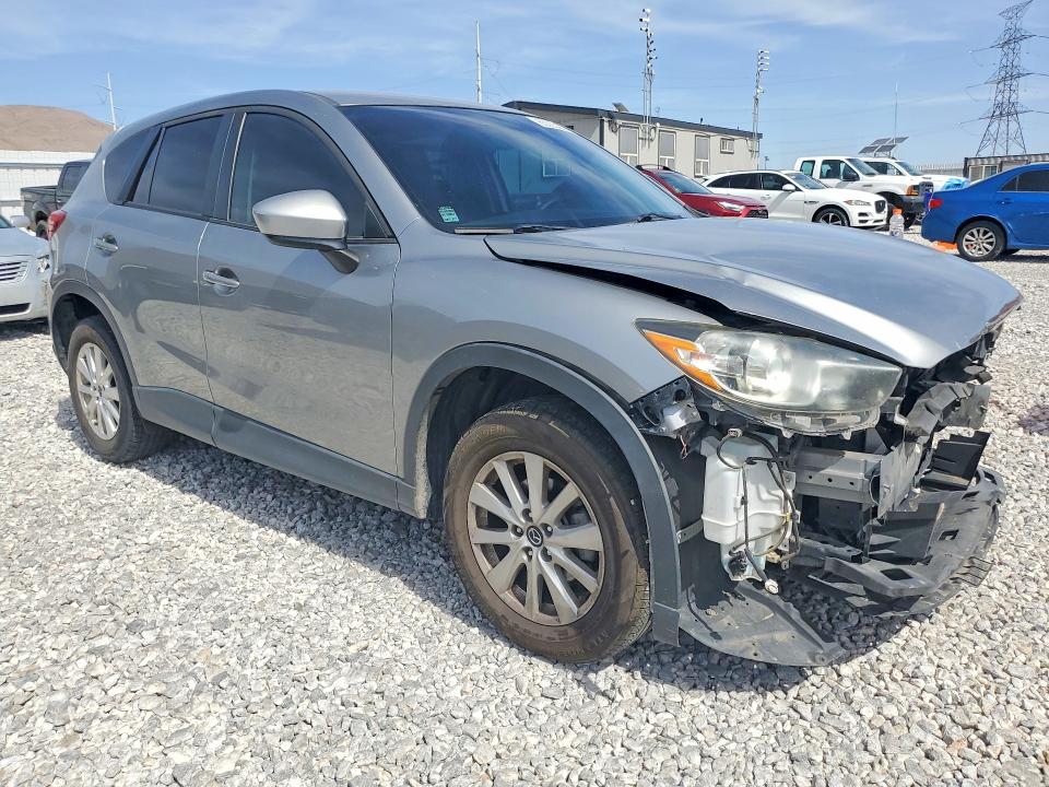 Photo 4 from auction – 2014 MAZDA CX-5 with VIN JM3KE2CY1E0389026