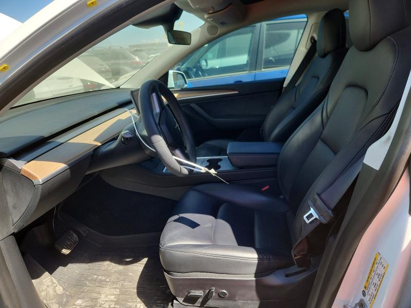 Photo 7 from auction – 2023 TESLA MODEL Y with VIN 7SAYGDEE3PF676547