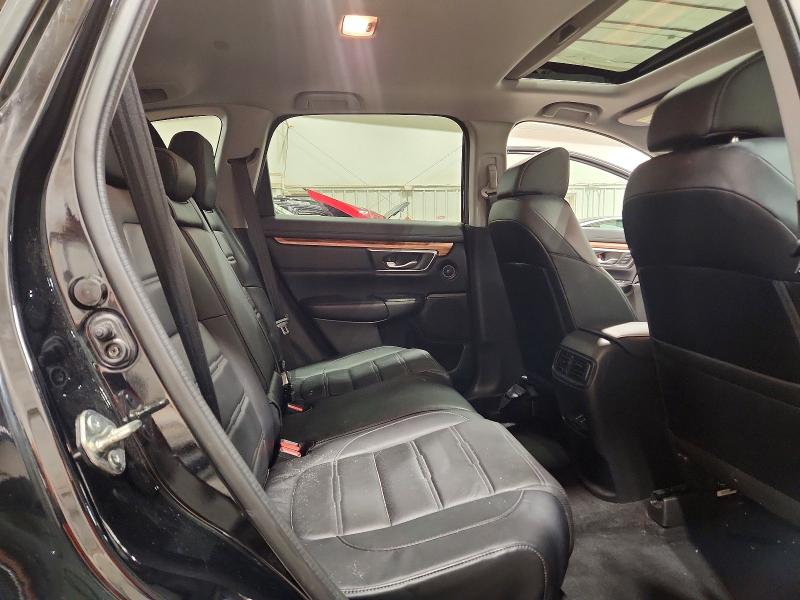 Photo 11 from auction – 2018 HONDA CR-V with VIN 7FARW2H81JE073378
