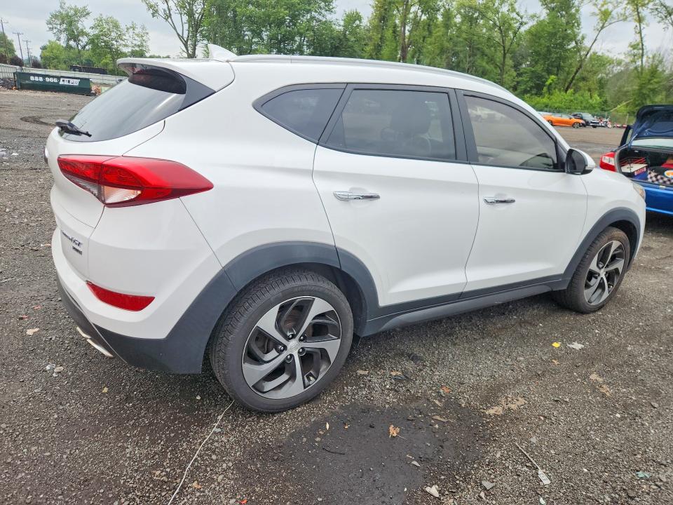 Photo 3 from auction – 2016 HYUNDAI TUCSON with VIN KM8J3CA26GU238463