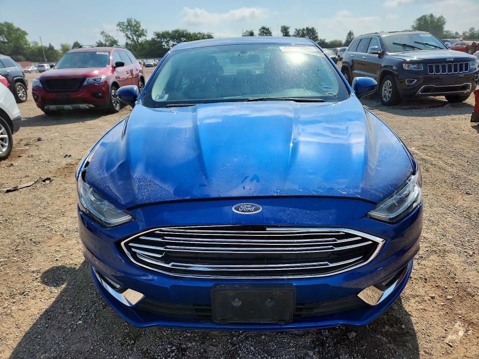 Photo 5 from auction – 2017 FORD FUSION with VIN 3FA6P0G76HR403510