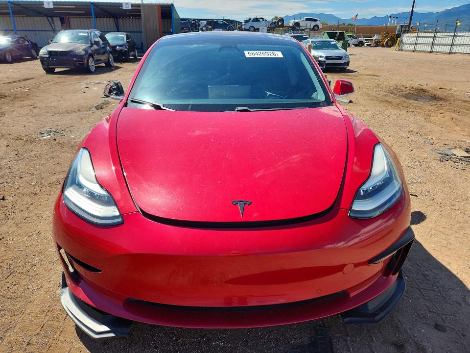 Photo 5 from auction – 2018 TESLA MODEL 3 with VIN 5YJ3E1EB7JF133484