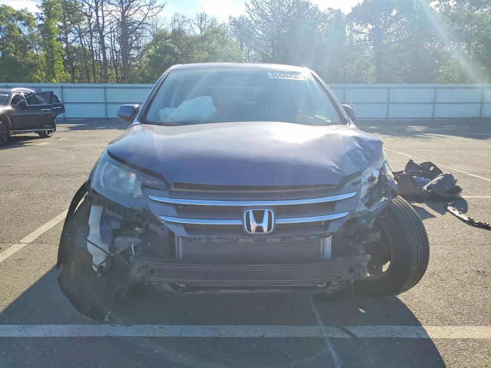 Photo 5 from auction – 2013 HONDA CR-V with VIN 2HKRM4H55DH626817