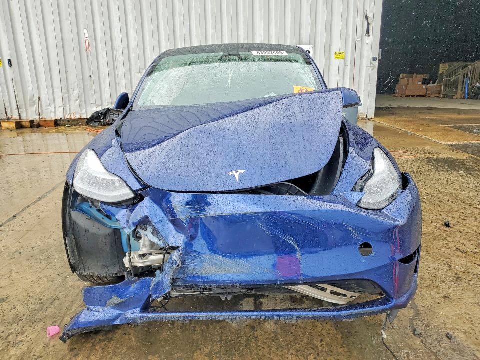 Photo 5 from auction – 2023 TESLA MODEL Y with VIN 7SAYGDEE3PF850925