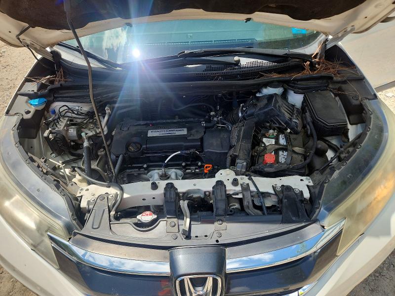 Photo 12 from auction – 2015 HONDA CR-V with VIN 5J6RM4H55FL132627