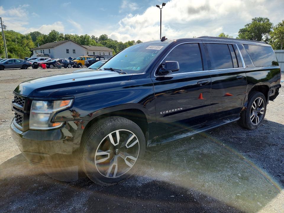 CHEVROLET SUBURBAN 2015 with VIN 1GNSKJKC6FR272399 - Photo from auction