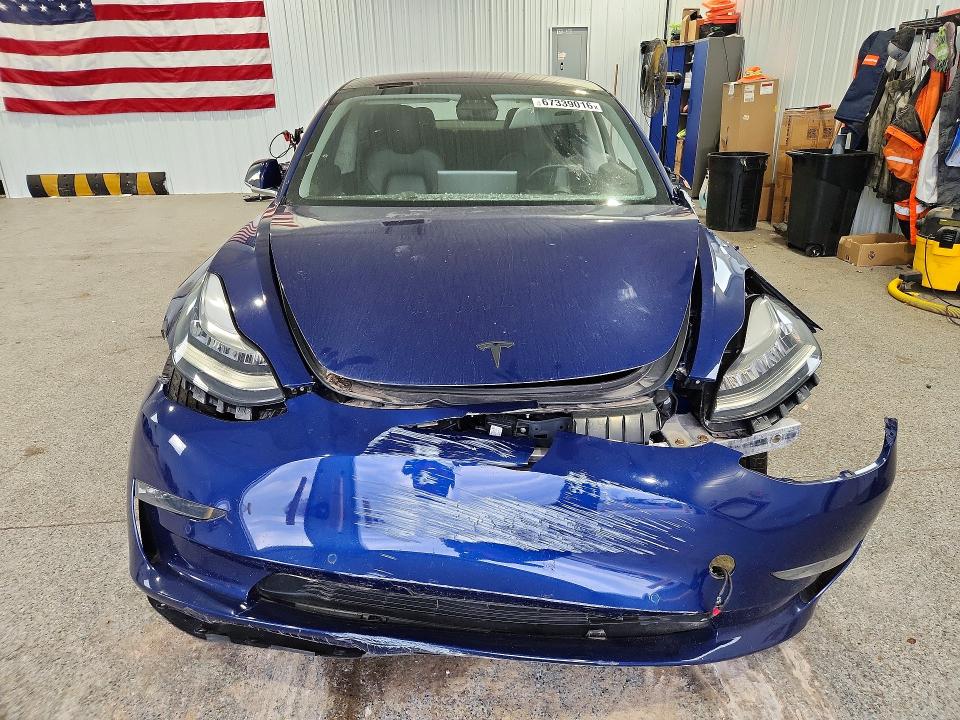 Photo 5 from auction – 2018 TESLA MODEL 3 with VIN 5YJ3E1EA5JF125035