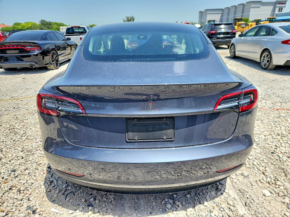 Photo 6 from auction – 2023 TESLA MODEL 3 with VIN 5YJ3E1EA3PF694460