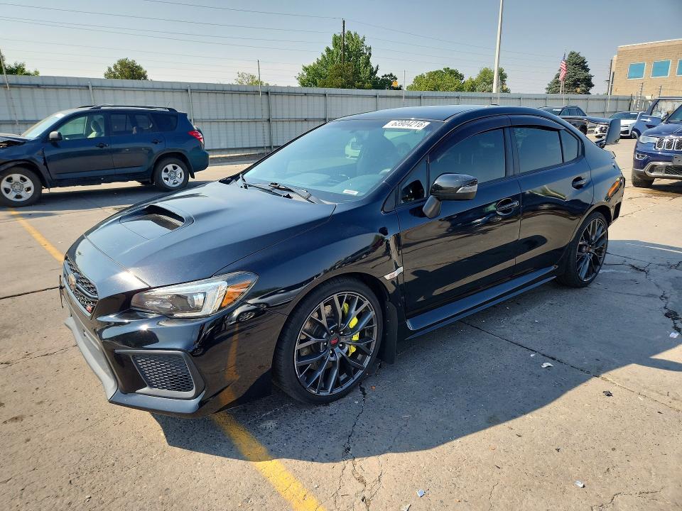 SUBARU WRX 2018 with VIN JF1VA2M6XJ9820909 - Photo from auction