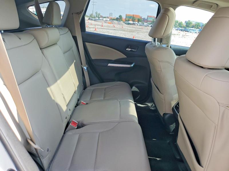 Photo 11 from auction – 2015 HONDA CR-V with VIN 5J6RM4H72FL003486