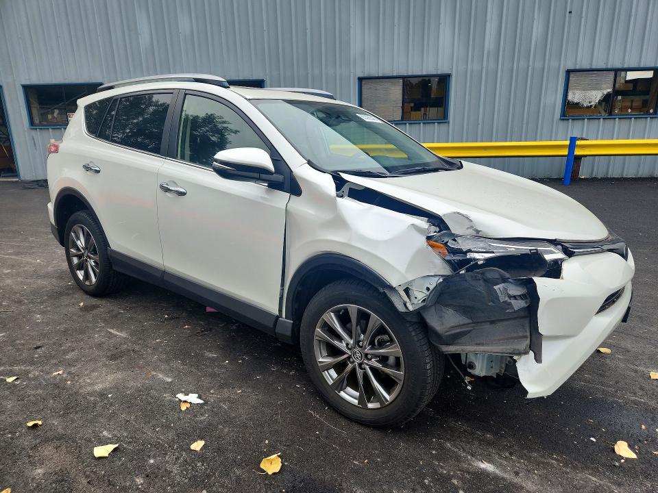 Photo 4 from auction – 2018 TOYOTA RAV4 with VIN JTMDFREV7JJ733084