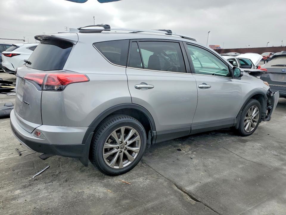 Photo 3 from auction – 2016 TOYOTA RAV4 with VIN 2T3YFREV2GW311932