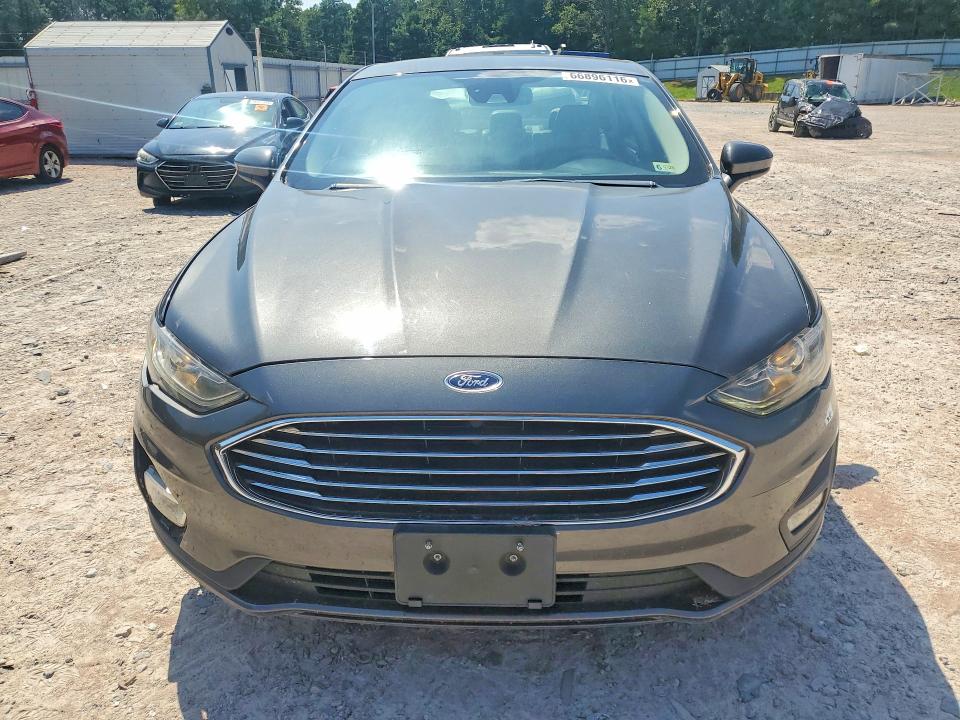 Foto 5 de la subasta – 2019 FORD FUSION con VIN 3FA6P0HD8KR112437