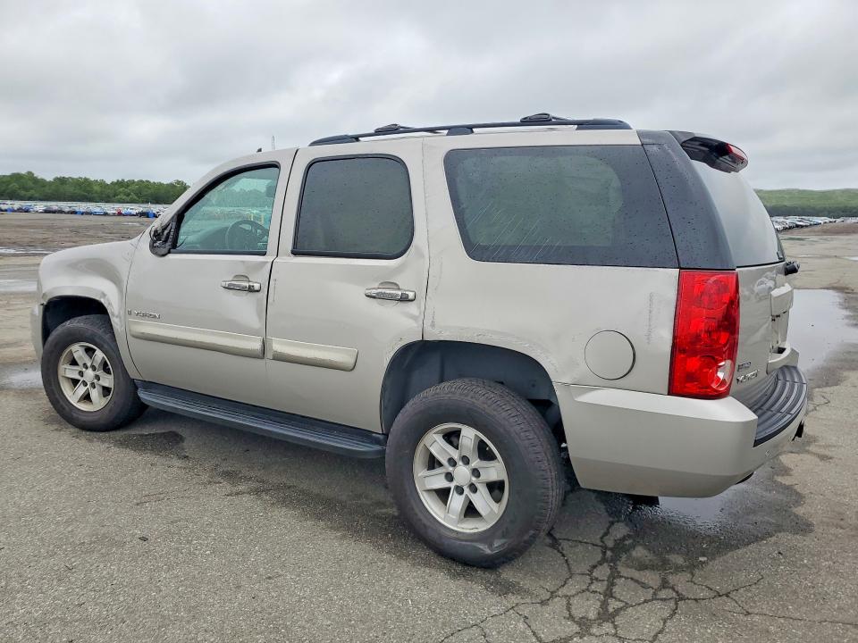 Photo 2 from auction – 2009 GMC YUKON with VIN 1GKFK23059J113093