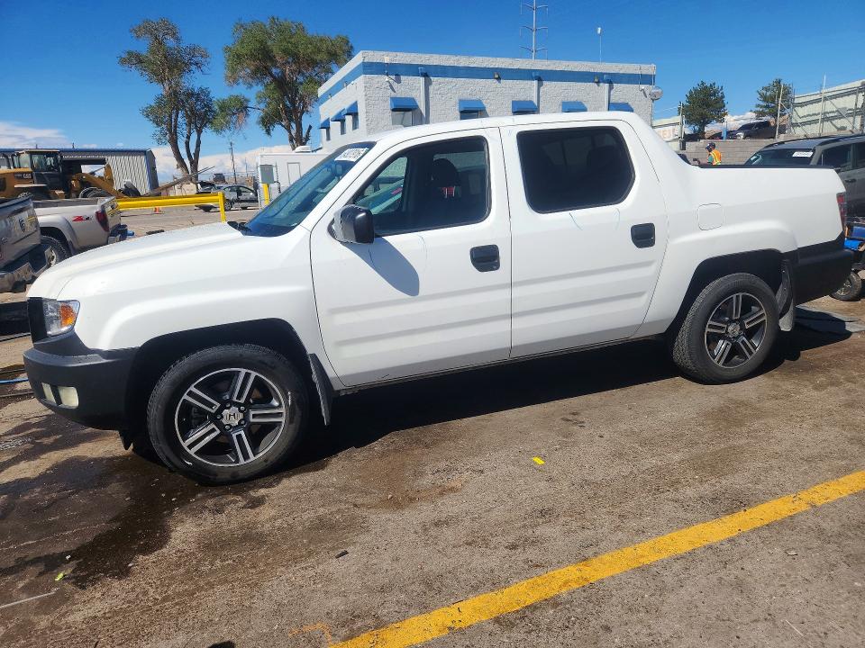 HONDA RIDGELINE 2014 with VIN 5FPYK1F73EB009427 - Photo from auction