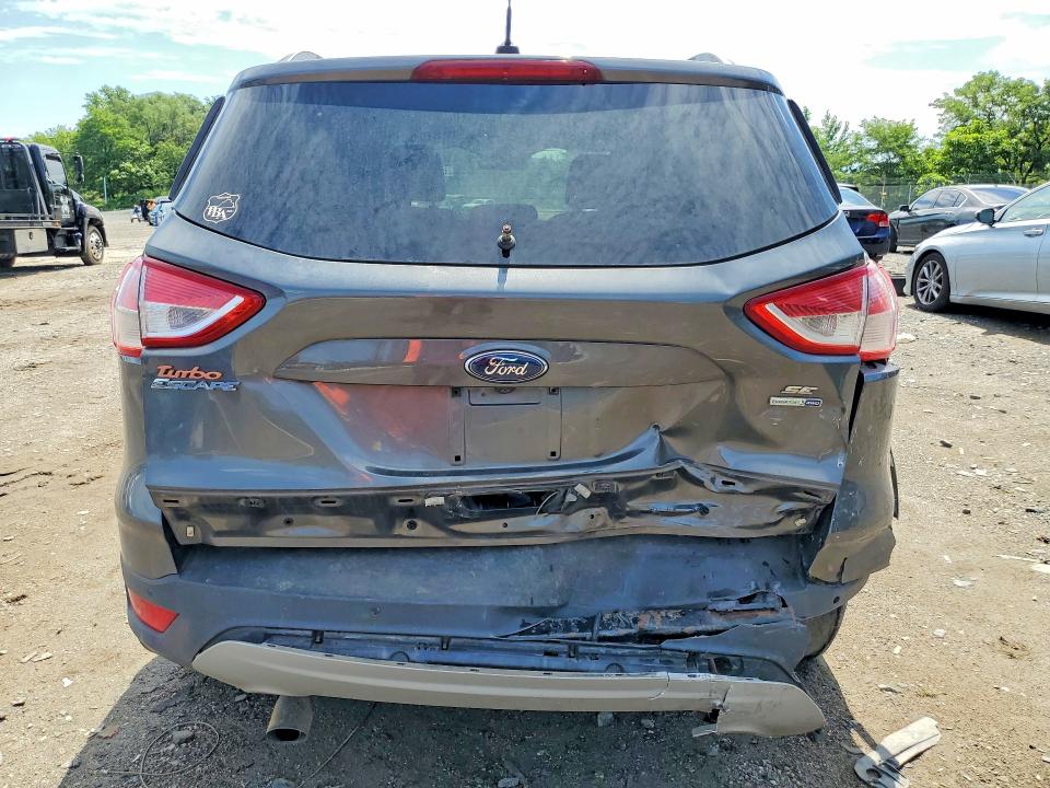 Photo 6 from auction – 2016 FORD ESCAPE with VIN 1FMCU9GX8GUA27681