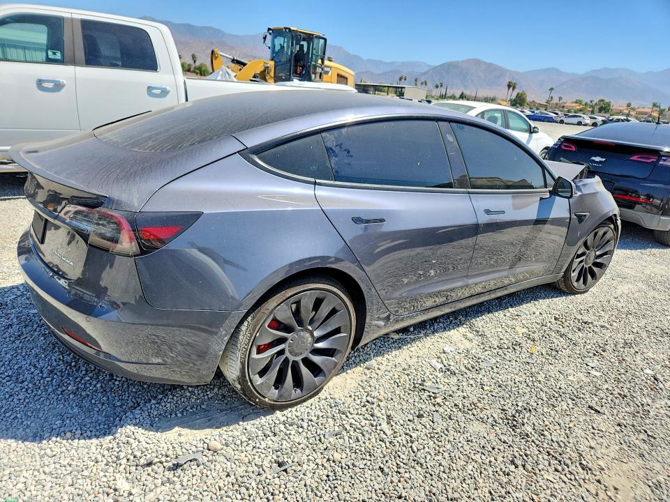 Photo 3 from auction – 2022 TESLA MODEL 3 with VIN 5YJ3E1EC2NF296378