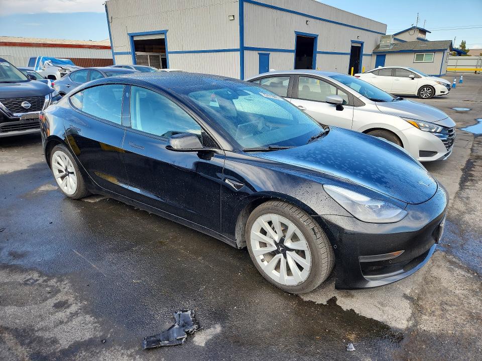 Photo 4 from auction – 2022 TESLA MODEL 3 with VIN 5YJ3E1EA8NF285674
