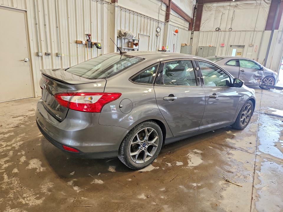 Photo 3 from auction – 2014 FORD FOCUS with VIN 1FADP3F29EL194675