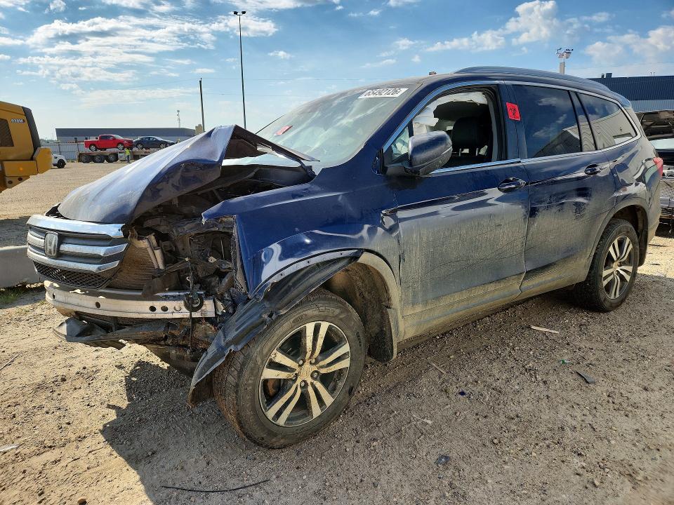 HONDA PILOT 2018 with VIN 5FNYF6H76JB504528 - Photo from auction